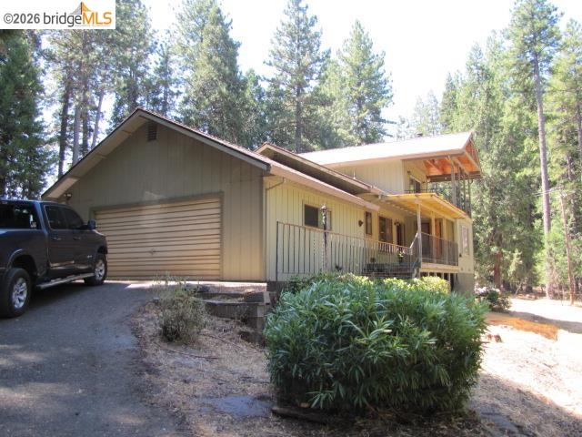 19071 West Allan Volcano, CA 95689 - Photo 37 of 42 a view of a house with a yard and garage