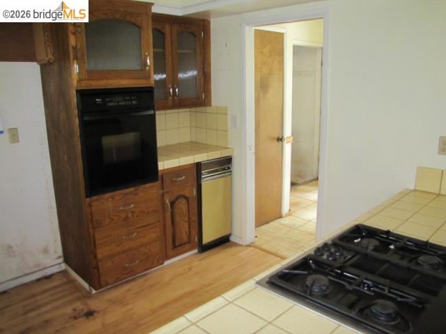 19071 West Allan Volcano, CA 95689 - Photo 7 of 42 a kitchen with stove and cabinets