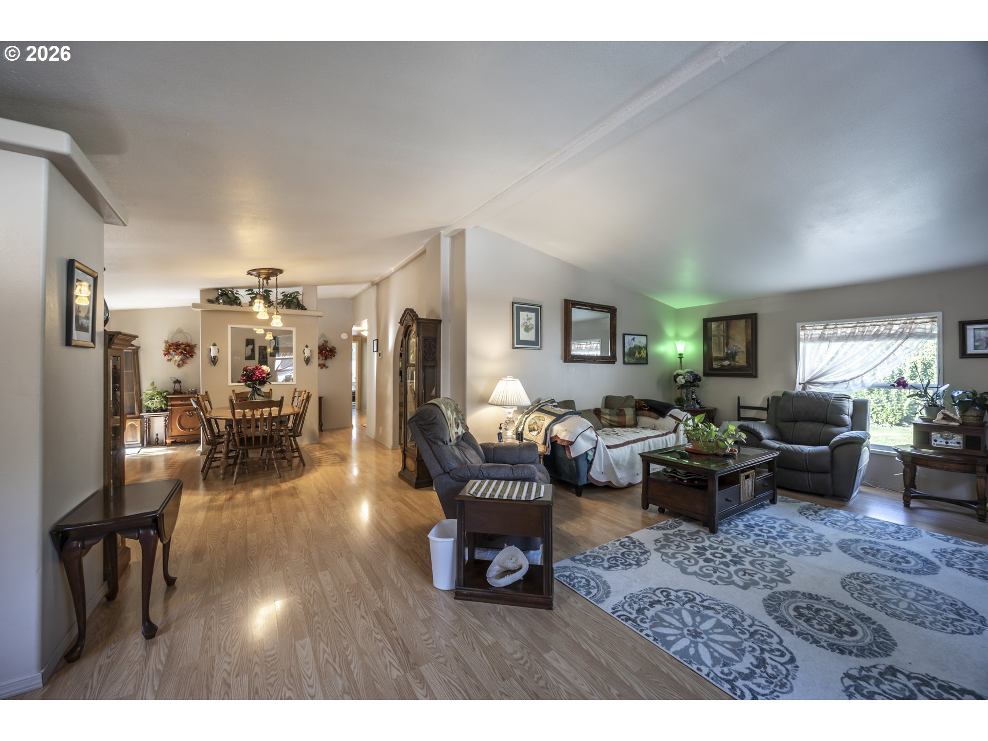 9580 North Fork Siuslaw Road Florence, OR 97439 - Photo 18 of 48 a living room with furniture and wooden floor
