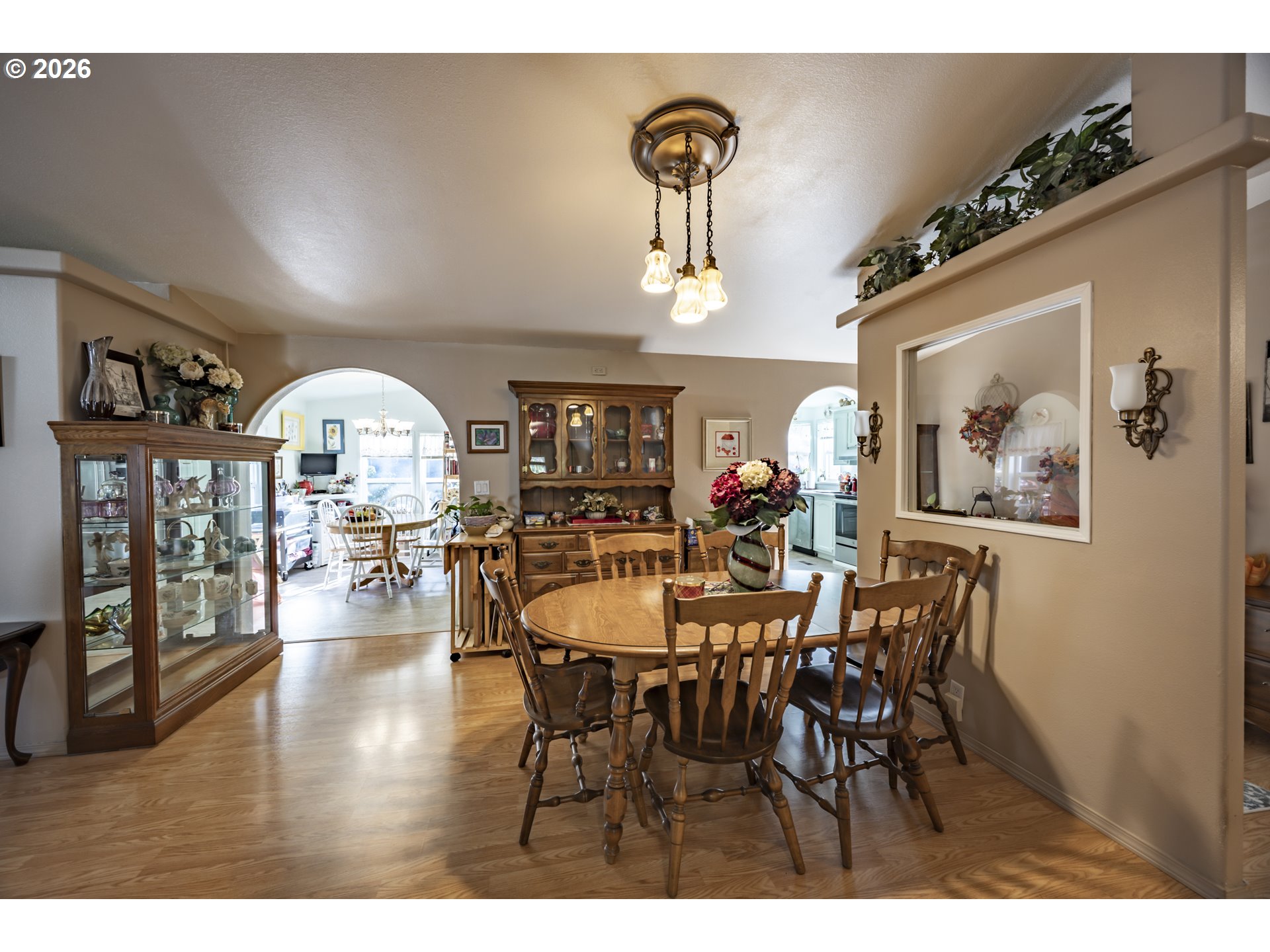 9580 North Fork Siuslaw Road Florence, OR 97439 - Photo 19 of 48 a view of a dining room with furniture and wooden floor