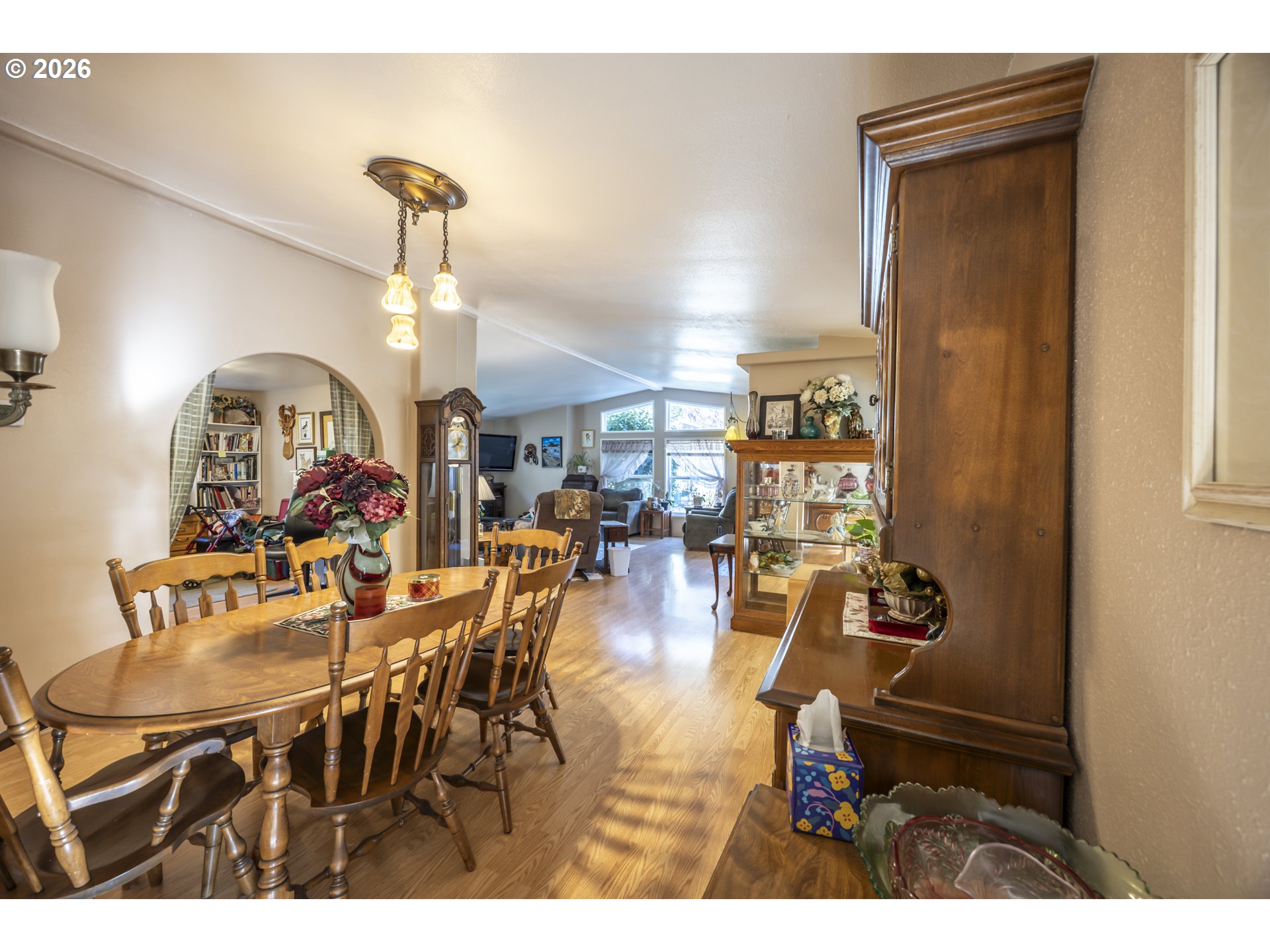 9580 North Fork Siuslaw Road Florence, OR 97439 - Photo 21 of 48 a view of a dining room with furniture and chandelier