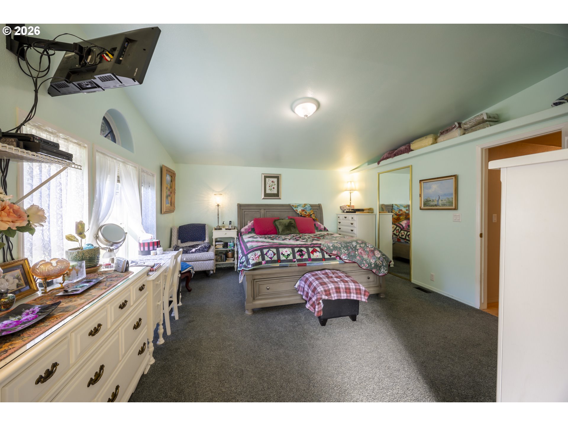 9580 North Fork Siuslaw Road Florence, OR 97439 - Photo 35 of 48 a bedroom with furniture and a bed
