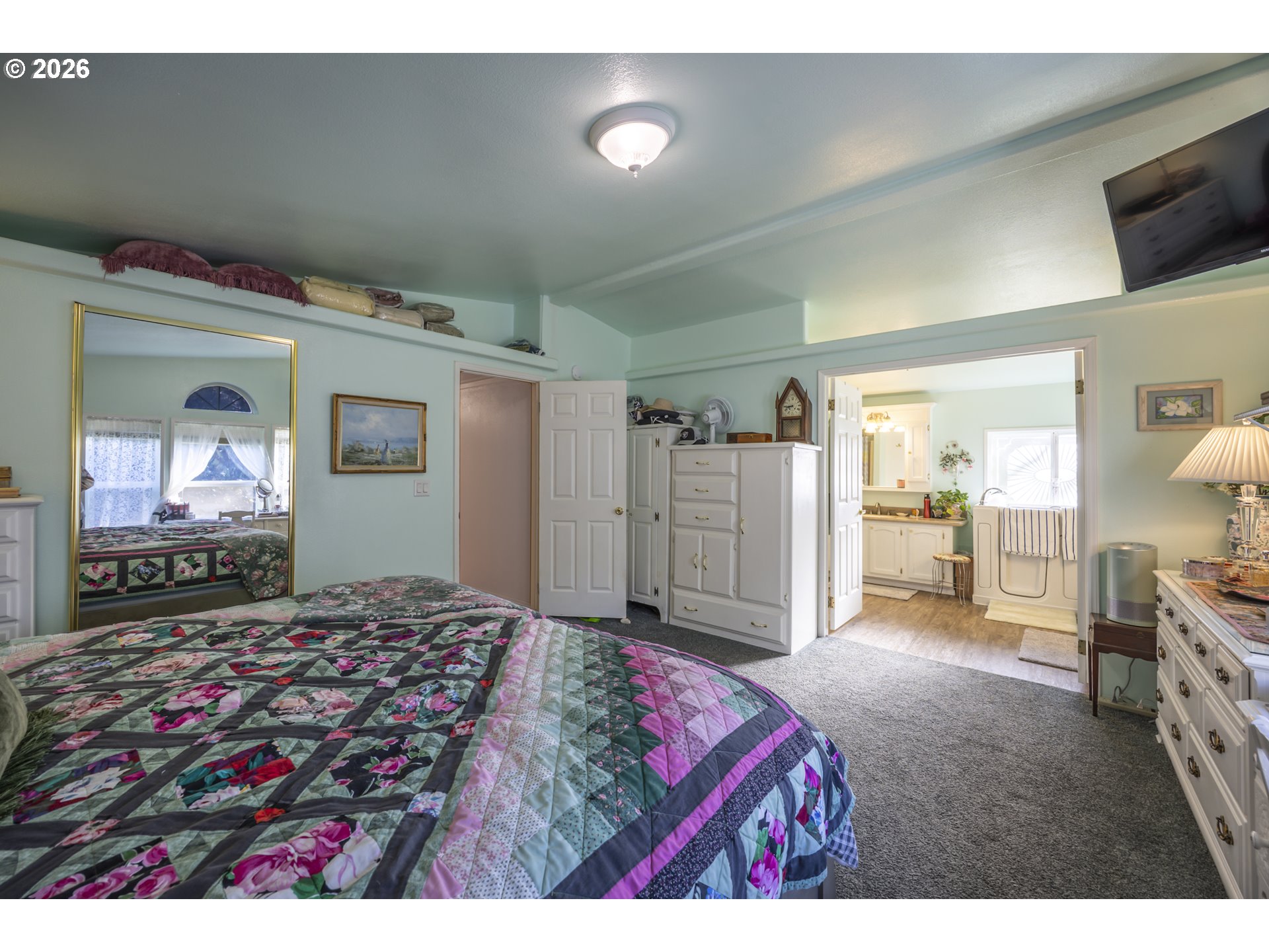 9580 North Fork Siuslaw Road Florence, OR 97439 - Photo 37 of 48 a living room with furniture and a flat screen tv