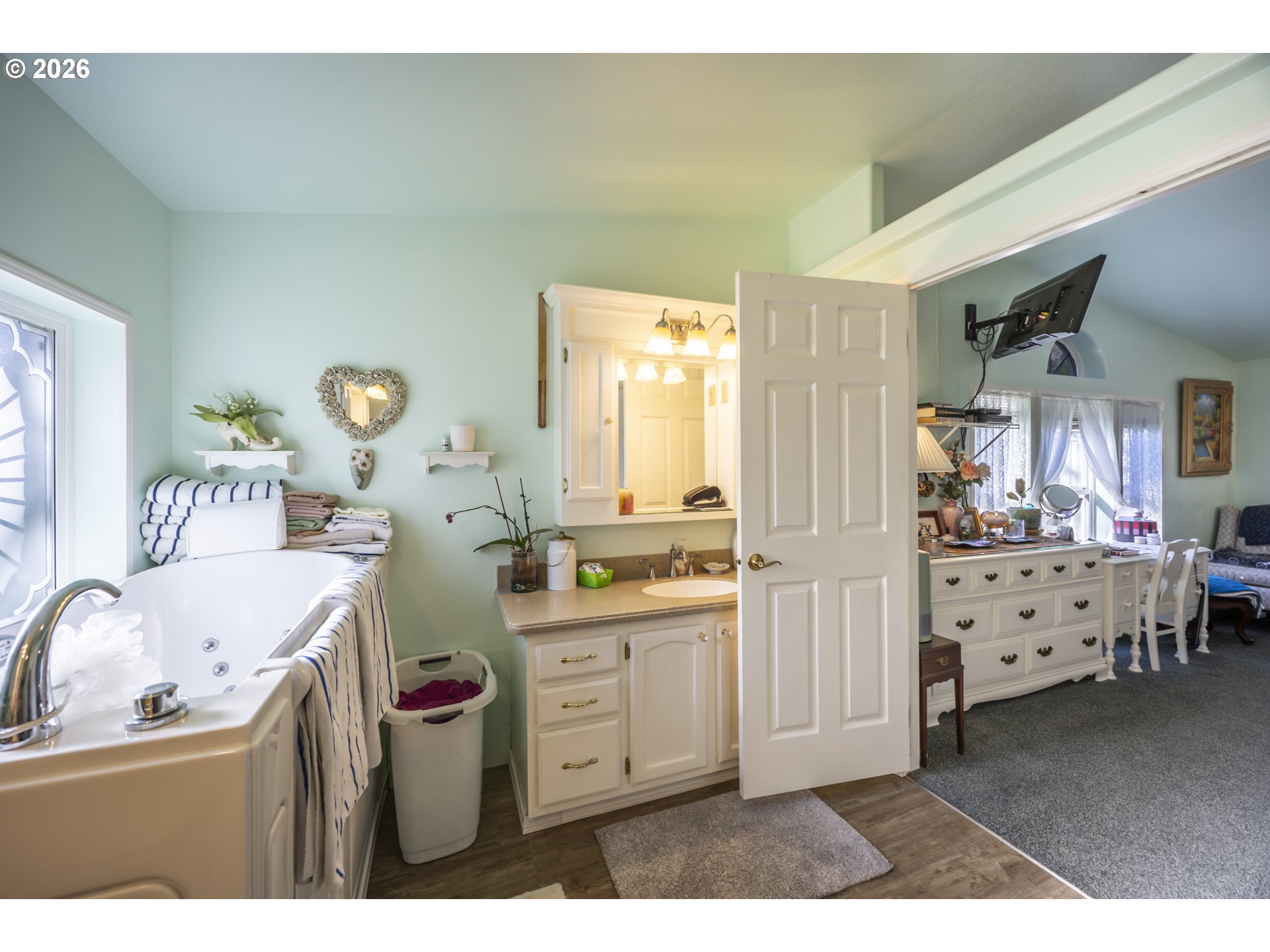 9580 North Fork Siuslaw Road Florence, OR 97439 - Photo 41 of 48 a kitchen with cabinets a stove and a sink