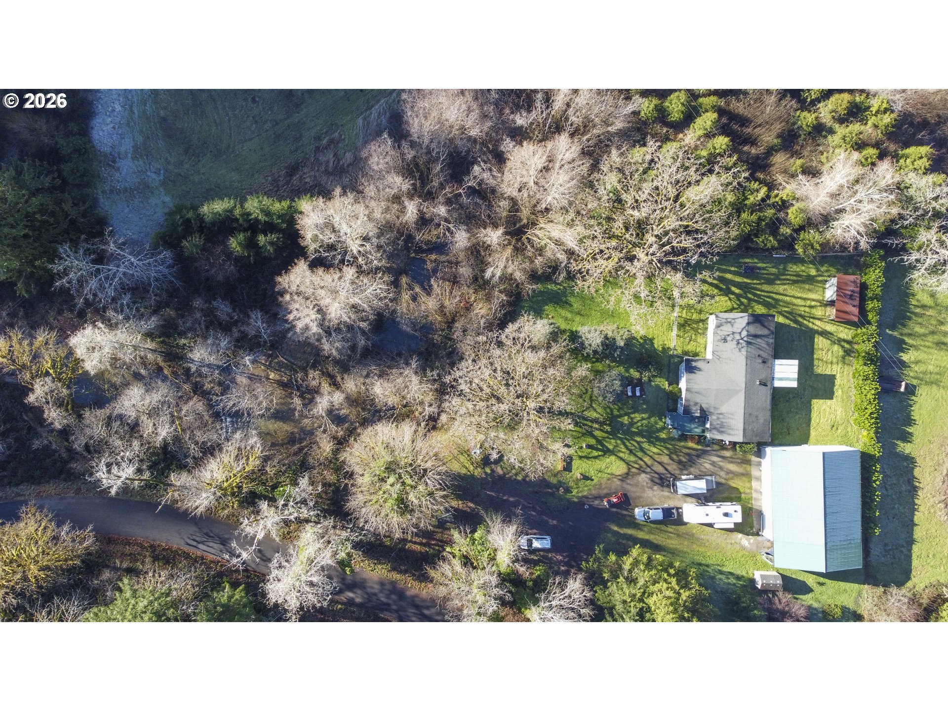9580 North Fork Siuslaw Road Florence, OR 97439 - Photo 47 of 48 a black and white photo of a house