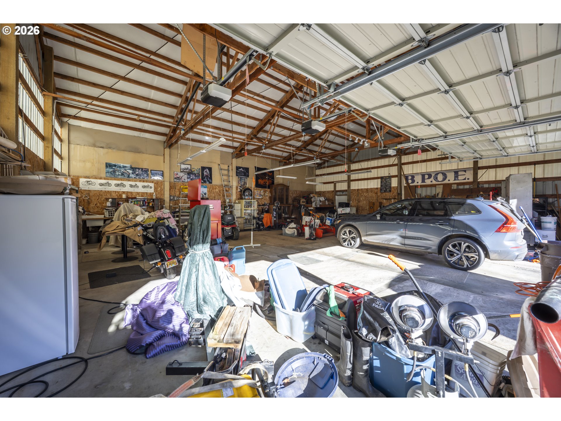 9580 North Fork Siuslaw Road Florence, OR 97439 - Photo 8 of 48 a view of a garage with furniture