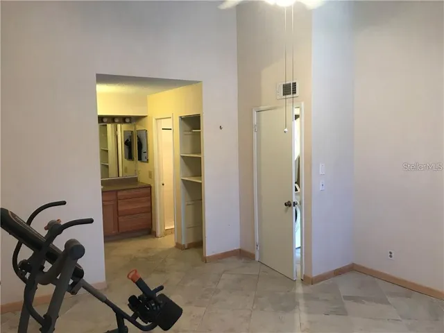 an entryway with a workspace