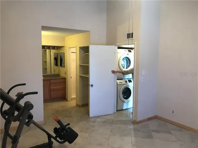 a view of a storage & utility room with washer and dryer