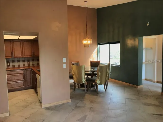 a view of kitchen with furniture and window