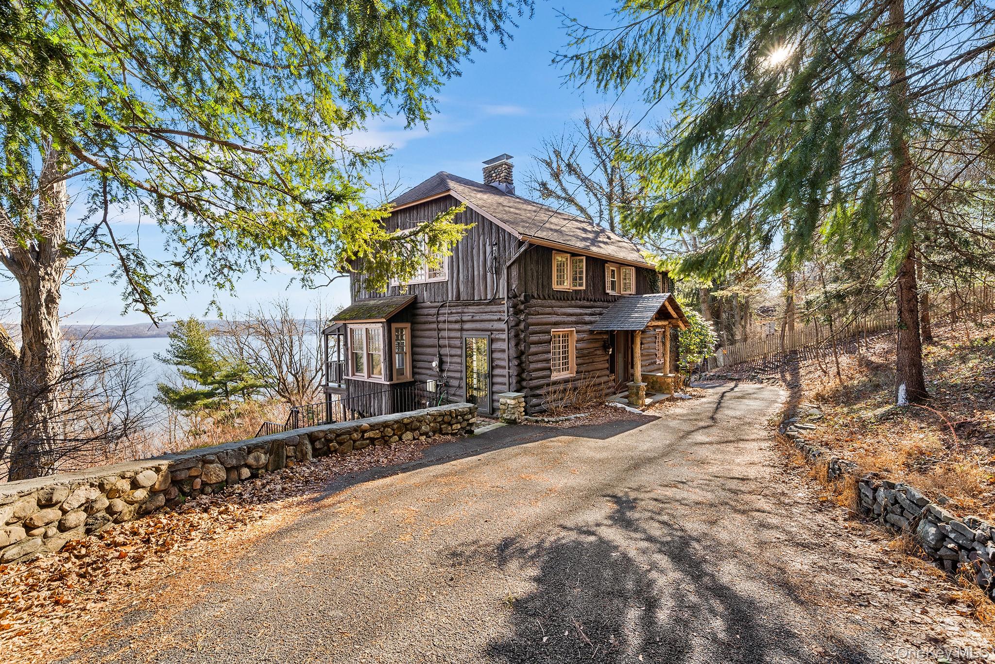 1007 Rte 9W Nyack, NY 10960 - Photo 1 of 45 a view of a house with a yard covered in snow