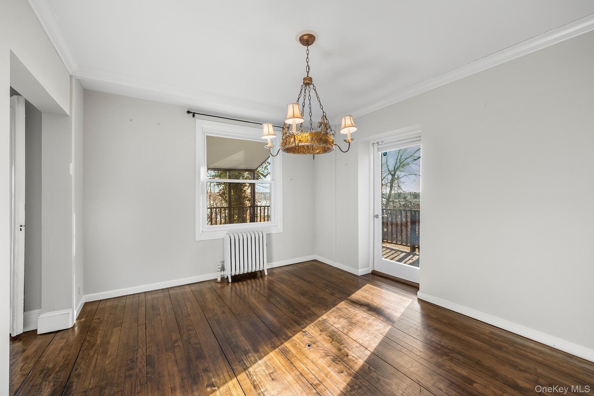 1007 Rte 9W Nyack, NY 10960 - Photo 12 of 45 a view of livingroom with window and wooden floor