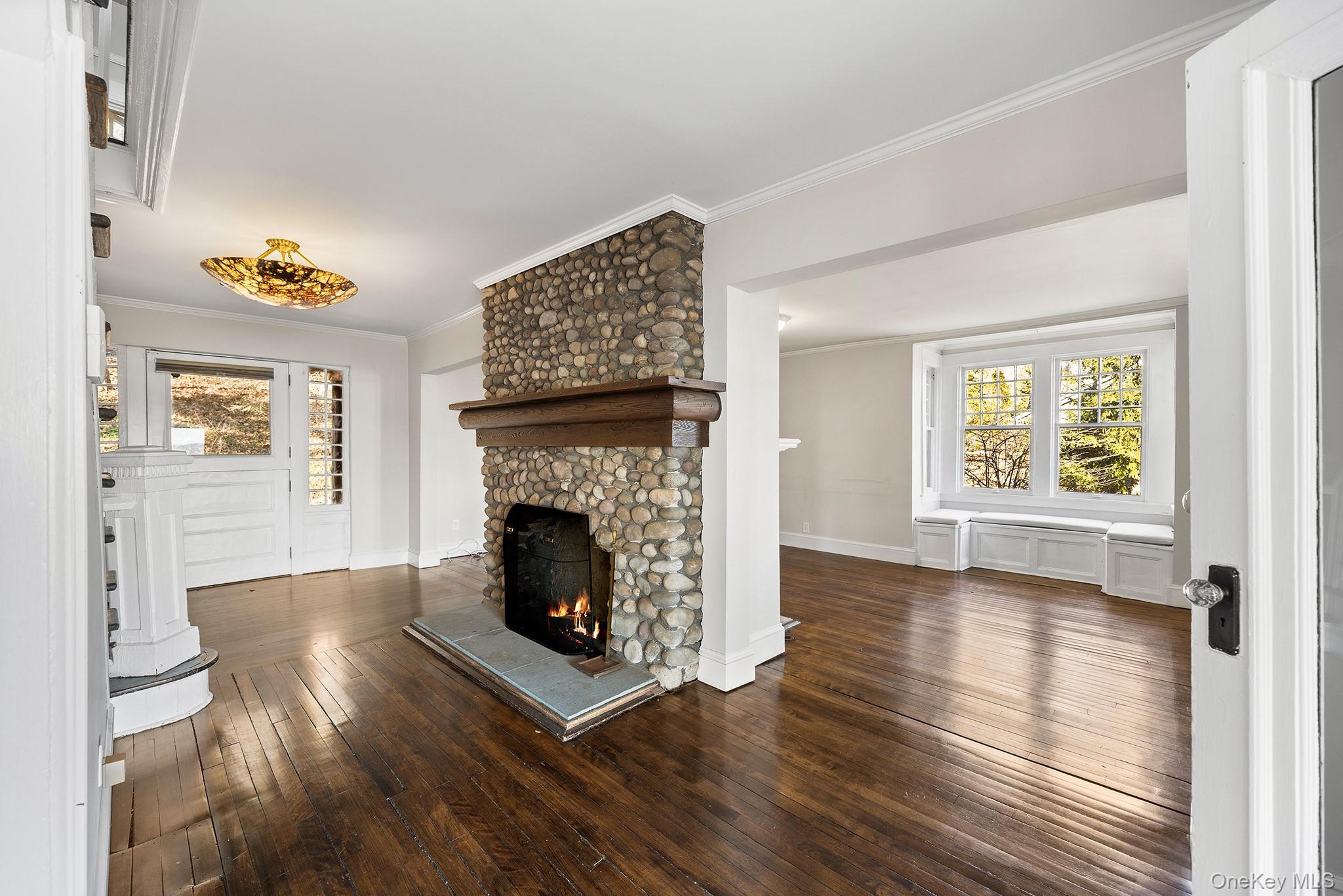 1007 Rte 9W Nyack, NY 10960 - Photo 7 of 45 a living room with furniture and a fireplace