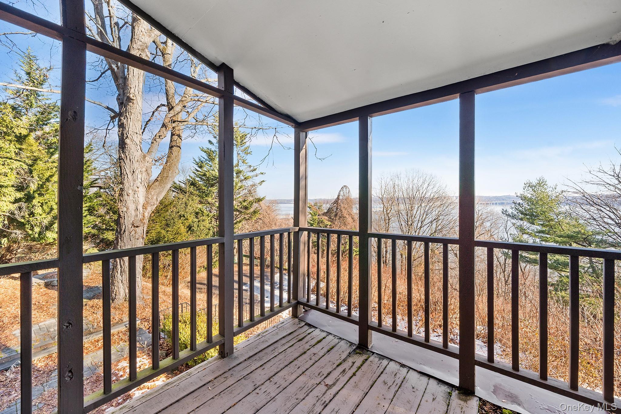 1007 Rte 9W Nyack, NY 10960 - Photo 10 of 45 a view of a porch with wooden floor