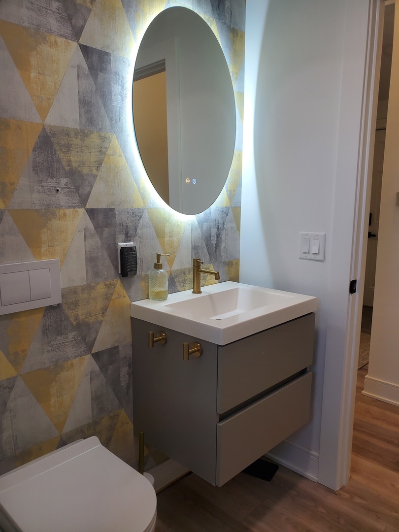 4-a94 Springfield Drive Apple River, IL 61001 - Photo 33 of 35 a bathroom with a sink and a mirror