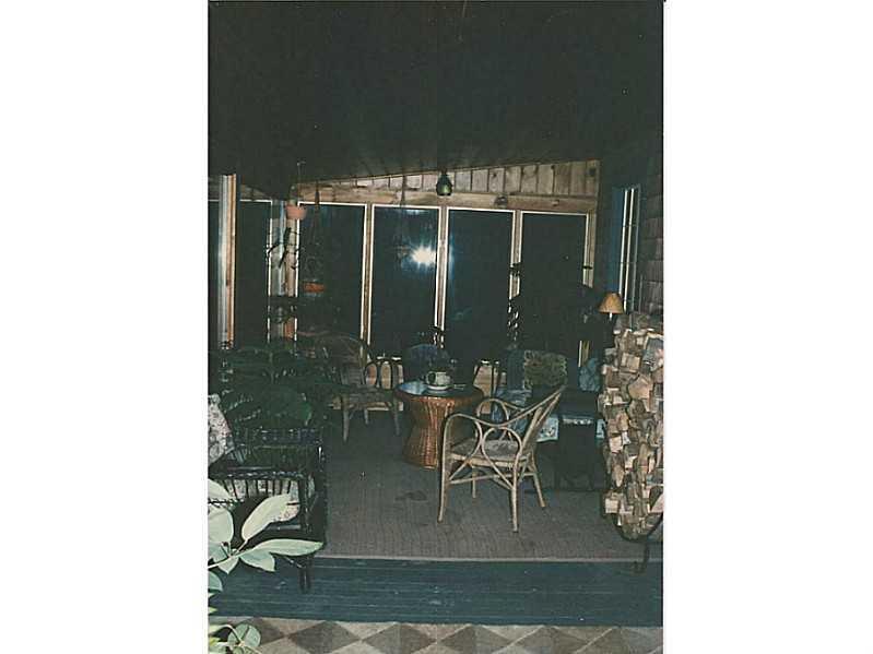 36 Golf Club Road Naples, ME 04055 - Photo 21 of 35 Patio/Deck. Lovely sunroom over...