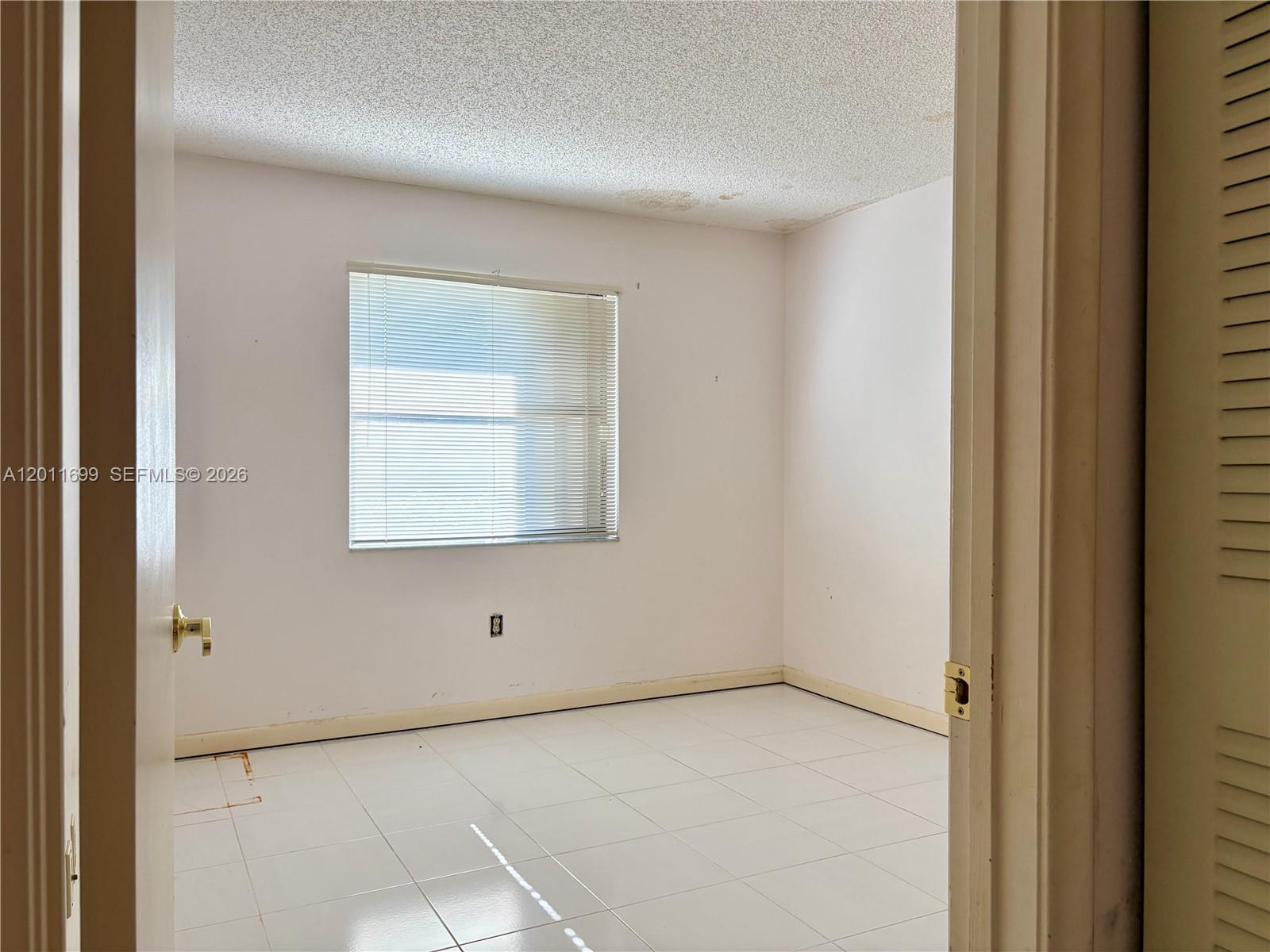 6700 Southwest 104th Court Miami, FL 33173 - Photo 17 of 51 Downstairs Bedroom