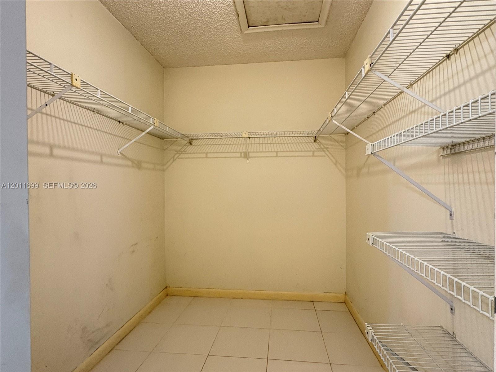 6700 Southwest 104th Court Miami, FL 33173 - Photo 31 of 51 Walk-in Closet in Primary Bedroom
