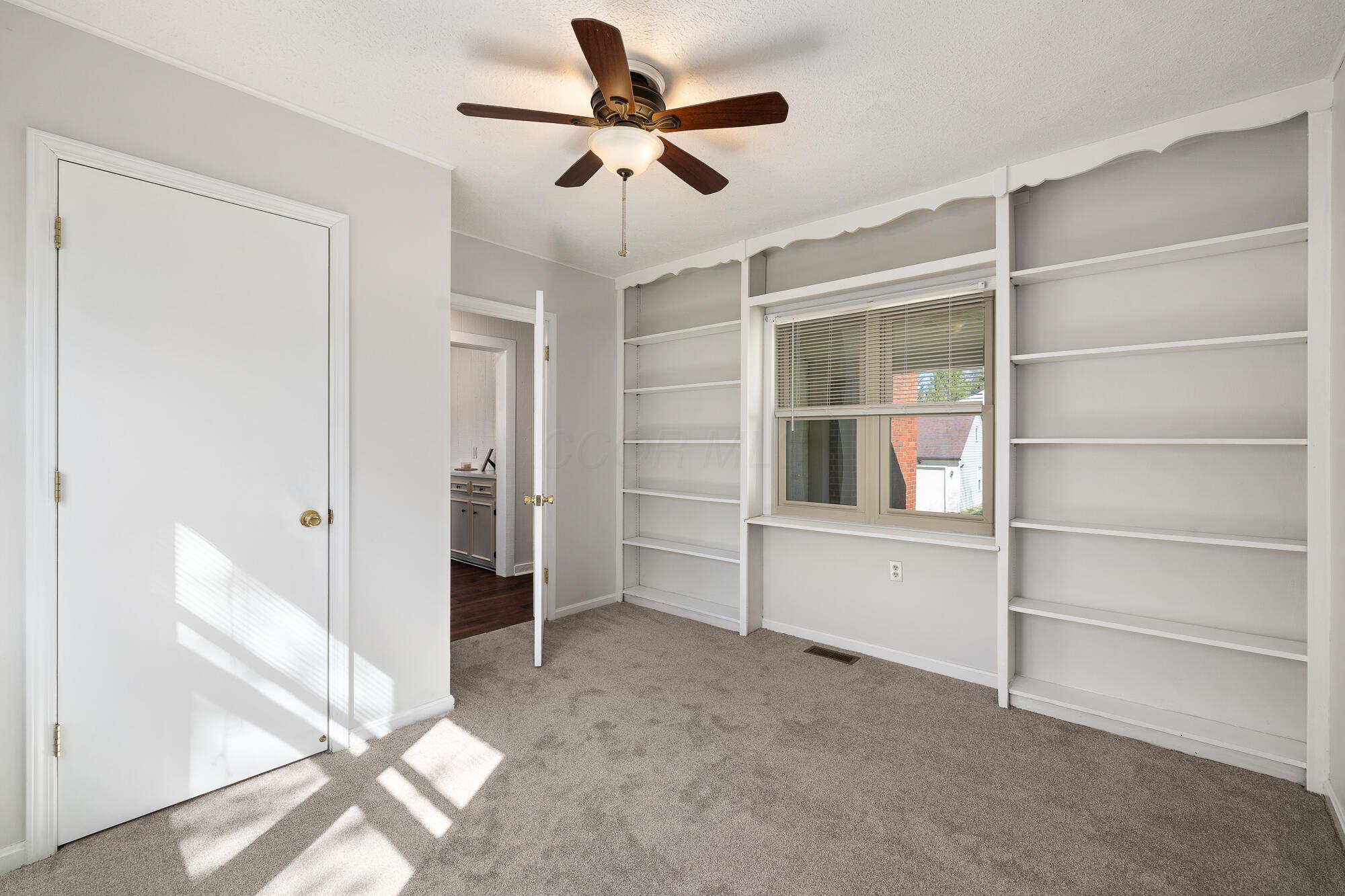 299 Taylor Road Mansfield, OH 44903 - Photo 11 of 40 Main floor bedroom with built-ins