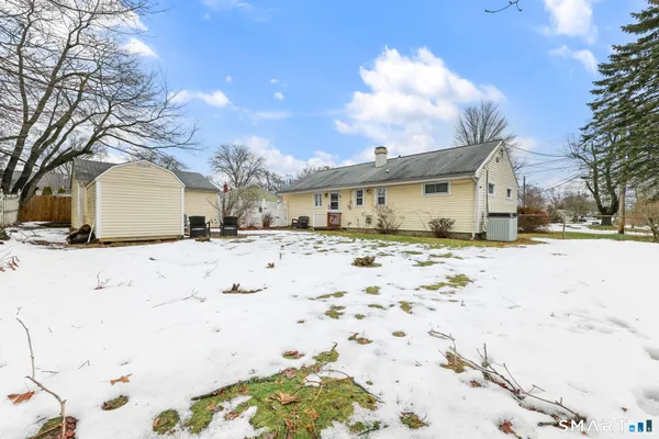 a view of snow on the side of the road