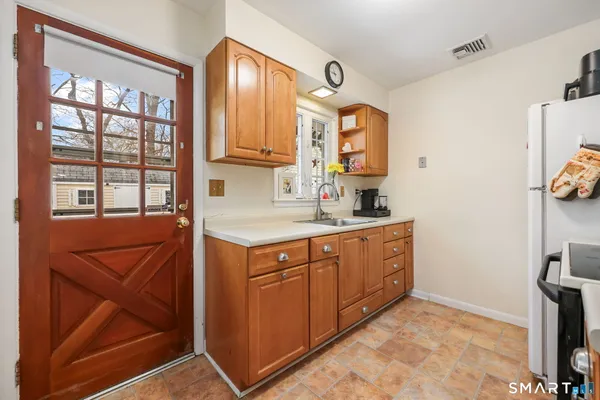 a bathroom with a sink a vanity and a mirror