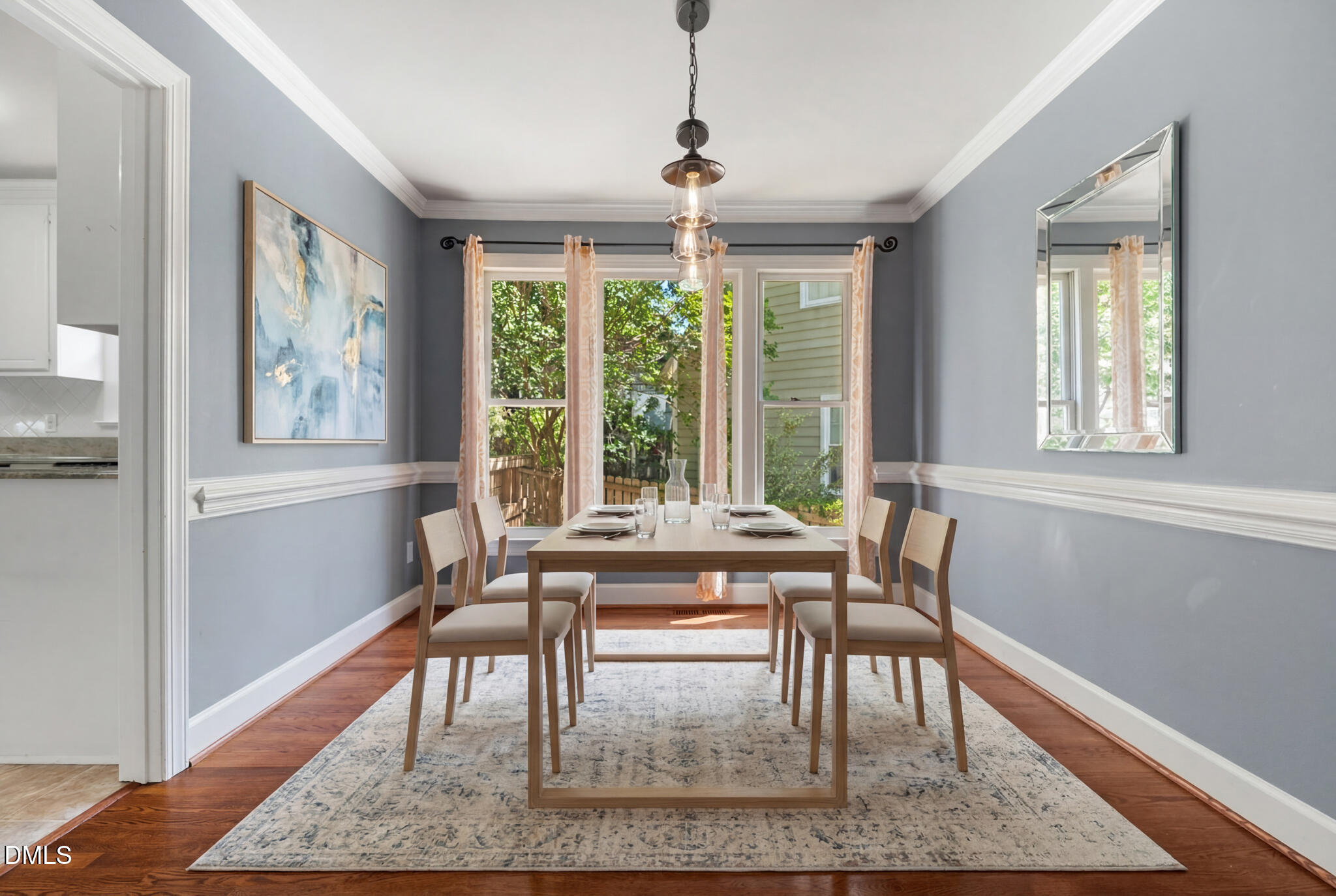 4712 Forest Highland Drive Raleigh, NC 27604 - Photo 17 of 53 a view of a dining room with furniture window and wooden floor