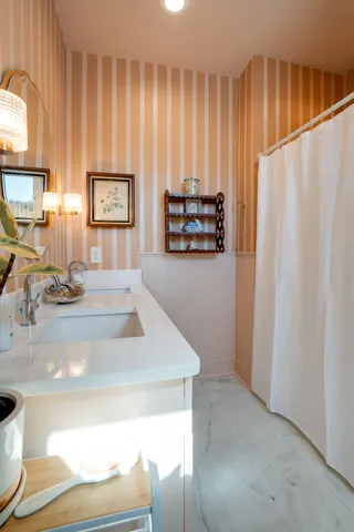 a view of kitchen with cabinets and outdoor space
