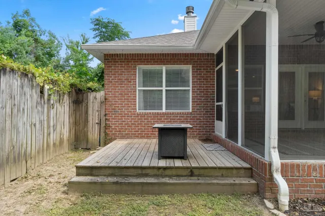 a view of an house with backyard space and garden
