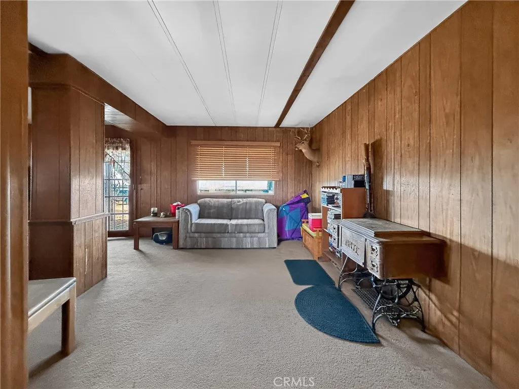 230 Patterson Road Rosamond, CA 93560 - Photo 12 of 18 a bed room with furniture and a window