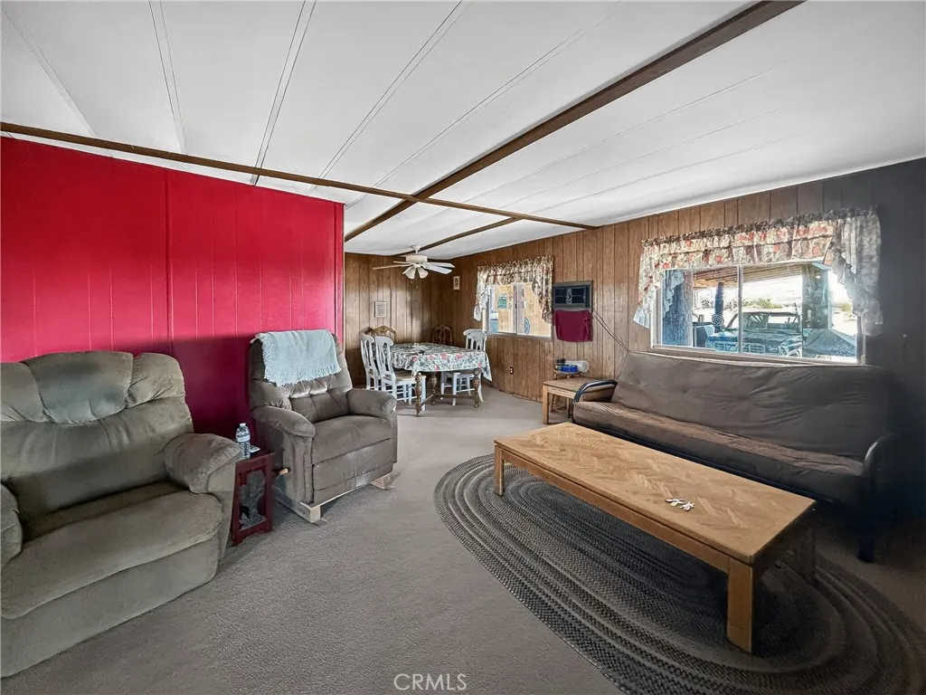 230 Patterson Road Rosamond, CA 93560 - Photo 7 of 18 a living room with furniture and a window