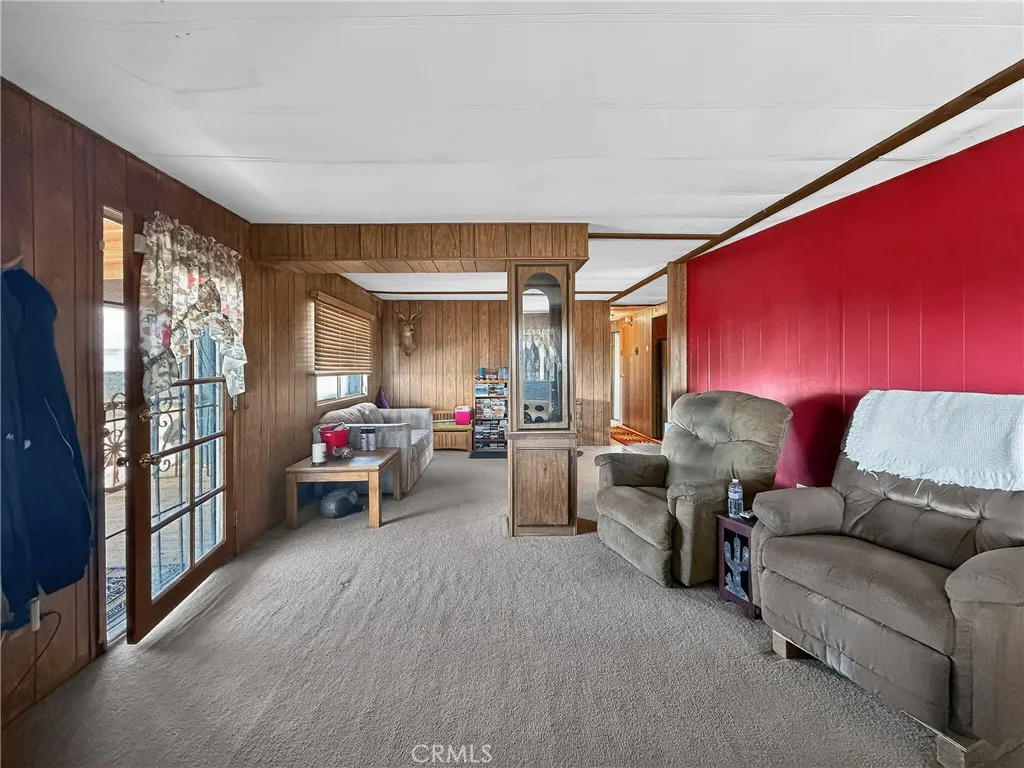 230 Patterson Road Rosamond, CA 93560 - Photo 8 of 18 a living room with furniture and a wooden floor