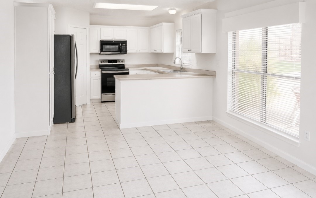 3814 Misty Ridge Drive Humble, TX 77396 - Photo 6 of 8 Kitchen with breakfast area