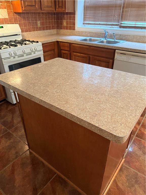 682 Bridge Way Lithonia, GA 30058 - Photo 7 of 25 a kitchen with a sink and a stove top oven