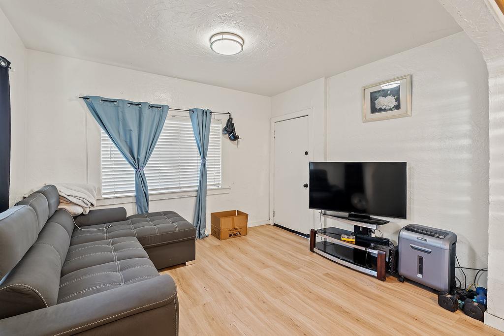 1205 Grand Avenue Santa Rosa, CA 95404 - Photo 15 of 27 a living room with furniture and a flat screen tv