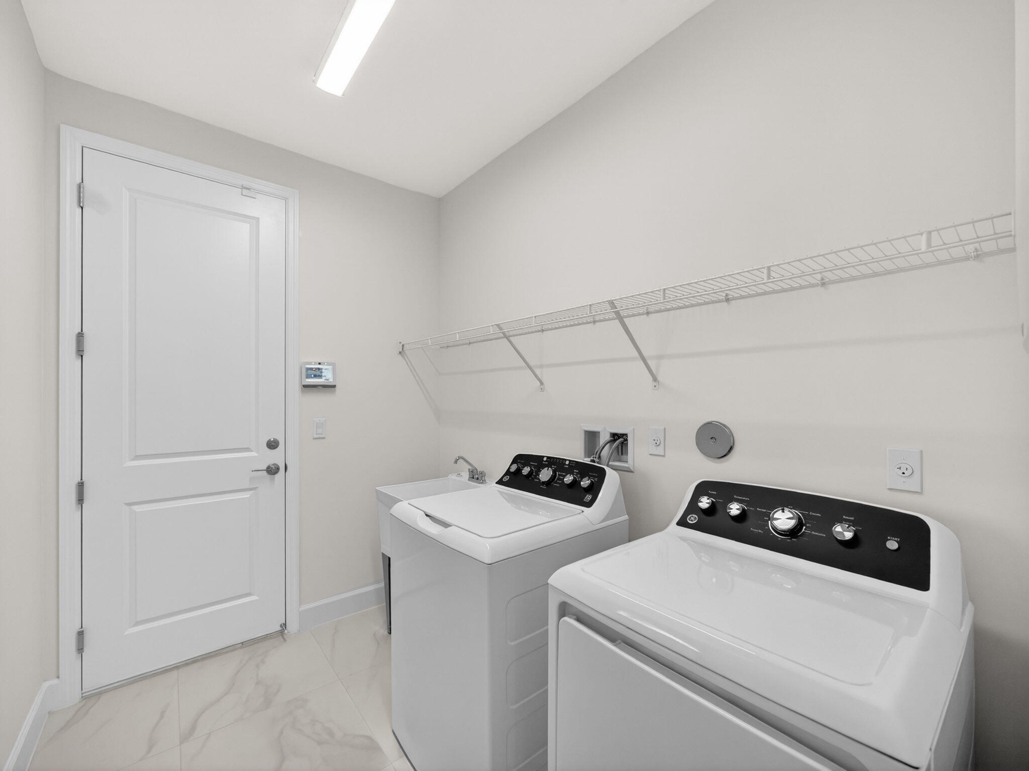 12406 Southwest High Tide Road Port St. Lucie, FL 34987 - Photo 20 of 60 Laundry/Utility Closet