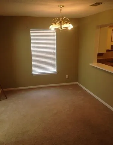 a view of a livingroom with a window