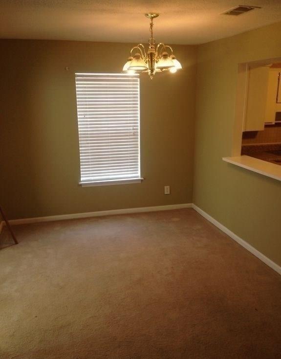 1417 Stone Mill Trace Stone Mountain, GA 30083 - Photo 7 of 9 a view of a livingroom with a window
