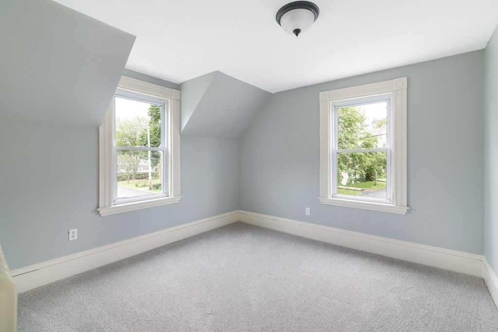24 Main Street Hull, MA 02045 - Photo 14 of 19 an empty room with a window