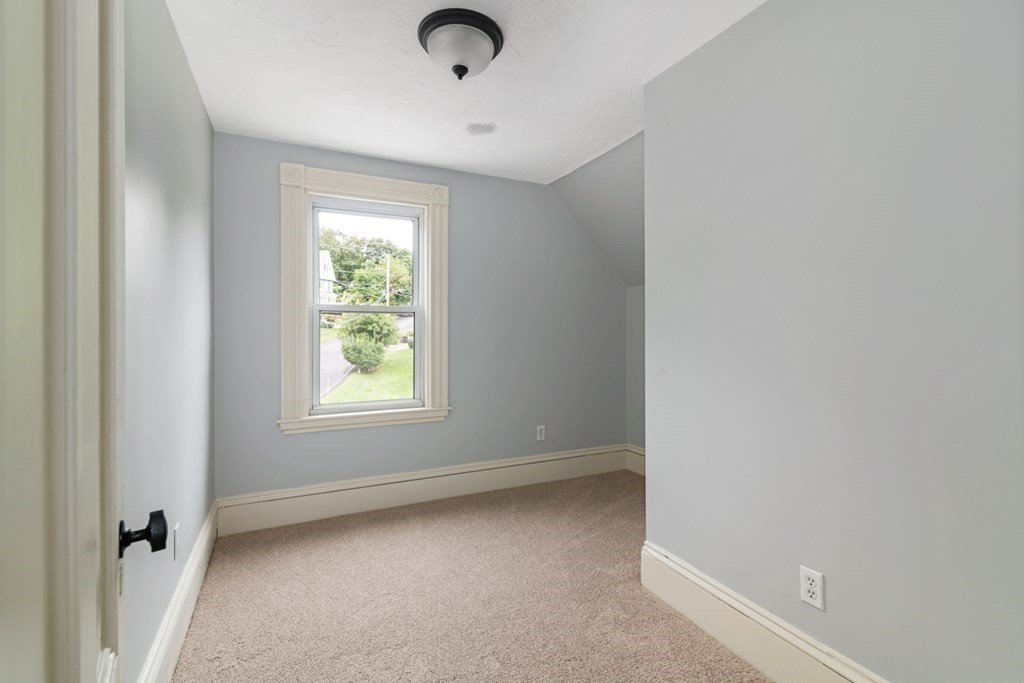 24 Main Street Hull, MA 02045 - Photo 15 of 19 an empty room with a window