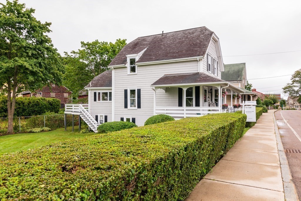 24 Main Street Hull, MA 02045 - Photo 3 of 19 a front view of house with yard and green space