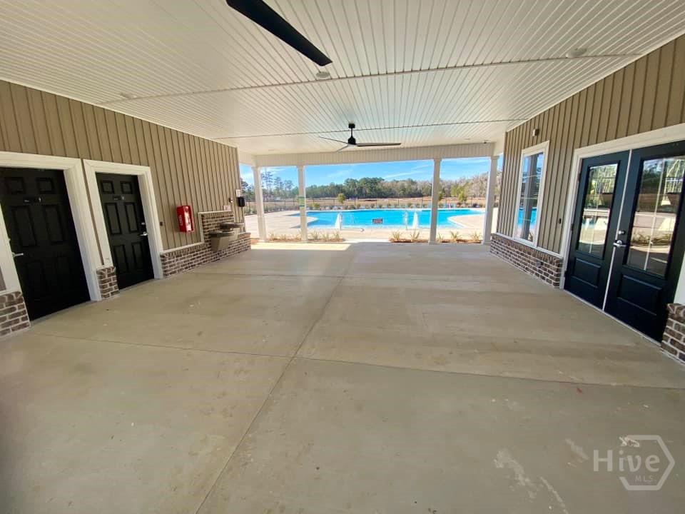 37 Blues Drive Pooler, GA 31322 - Photo 11 of 19 Community pool area - pavilion w / bathrooms and fitness room.