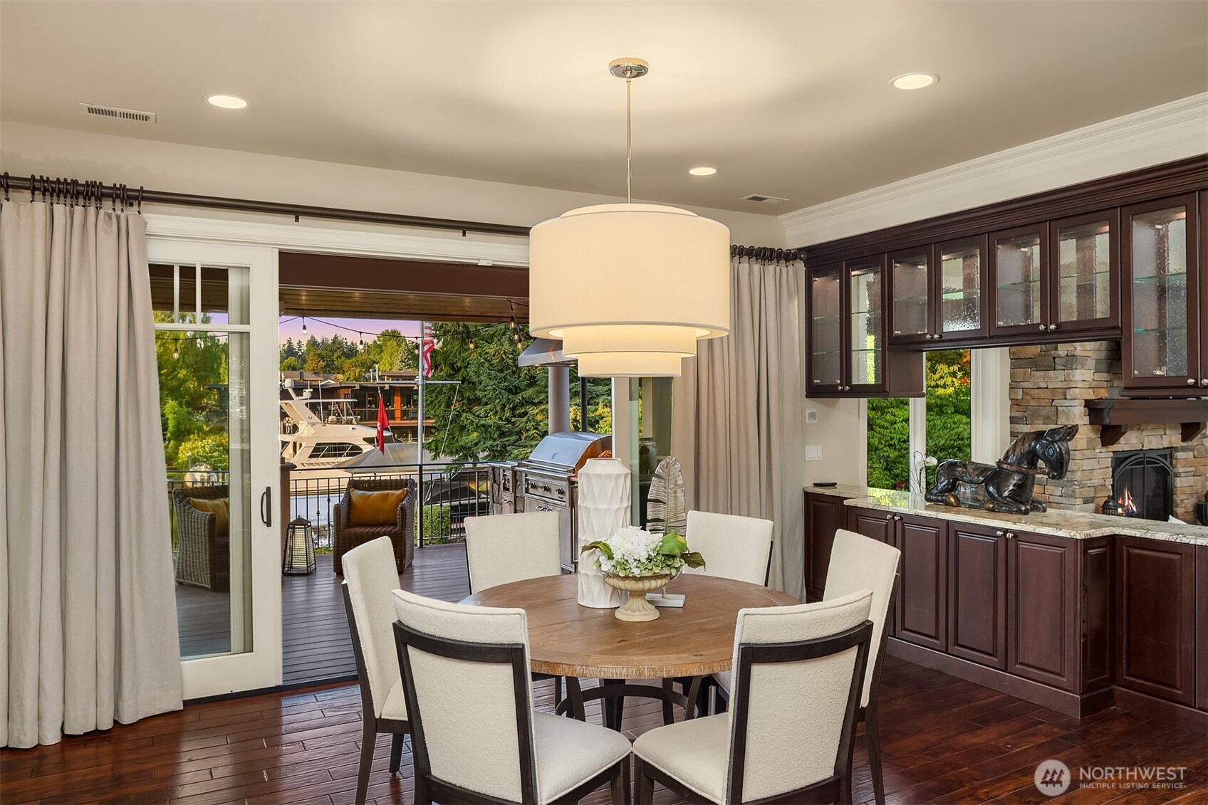 67 Cascade Key Bellevue, WA 98006 - Photo 11 of 39 a dining room with furniture a chandelier and wooden floor