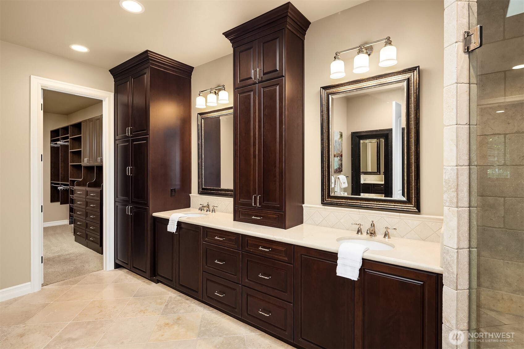 67 Cascade Key Bellevue, WA 98006 - Photo 17 of 39 a bathroom with a double vanity sink and a mirror