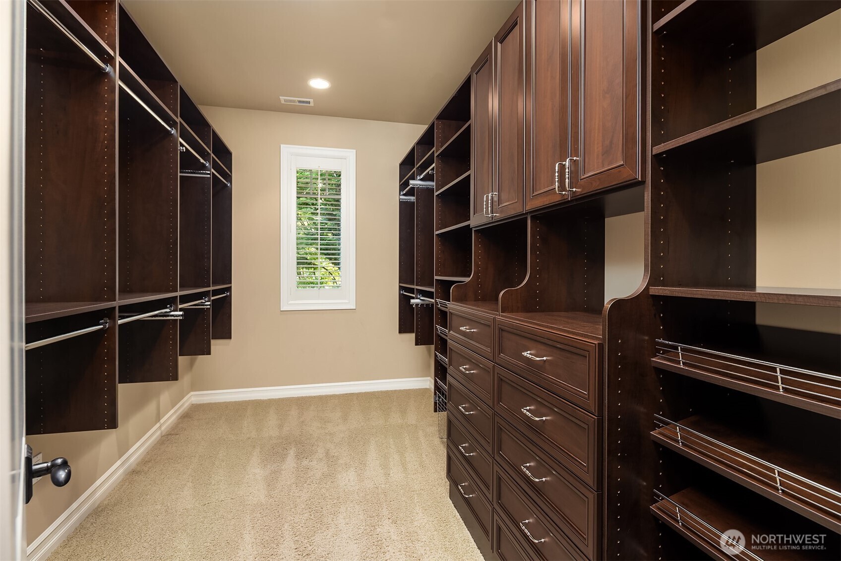 67 Cascade Key Bellevue, WA 98006 - Photo 19 of 39 a kitchen with wooden cabinets and a stove top oven