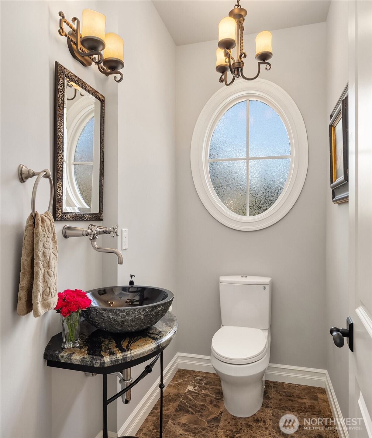 67 Cascade Key Bellevue, WA 98006 - Photo 23 of 39 a bathroom with a toilet sink and mirror