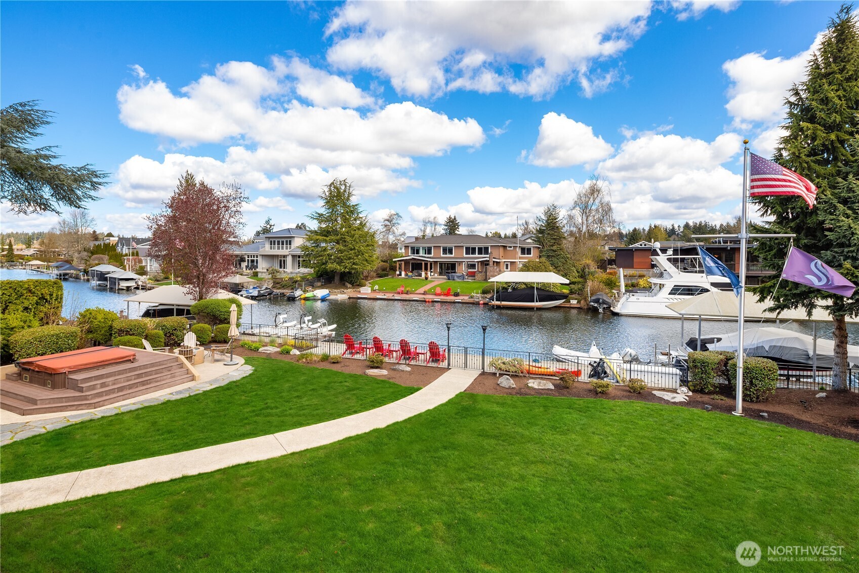 67 Cascade Key Bellevue, WA 98006 - Photo 27 of 39 a view of a lake with lawn chairs