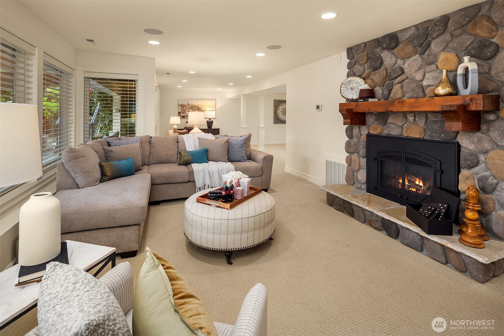 67 Cascade Key Bellevue, WA 98006 - Photo 30 of 39 a living room with furniture and a fireplace