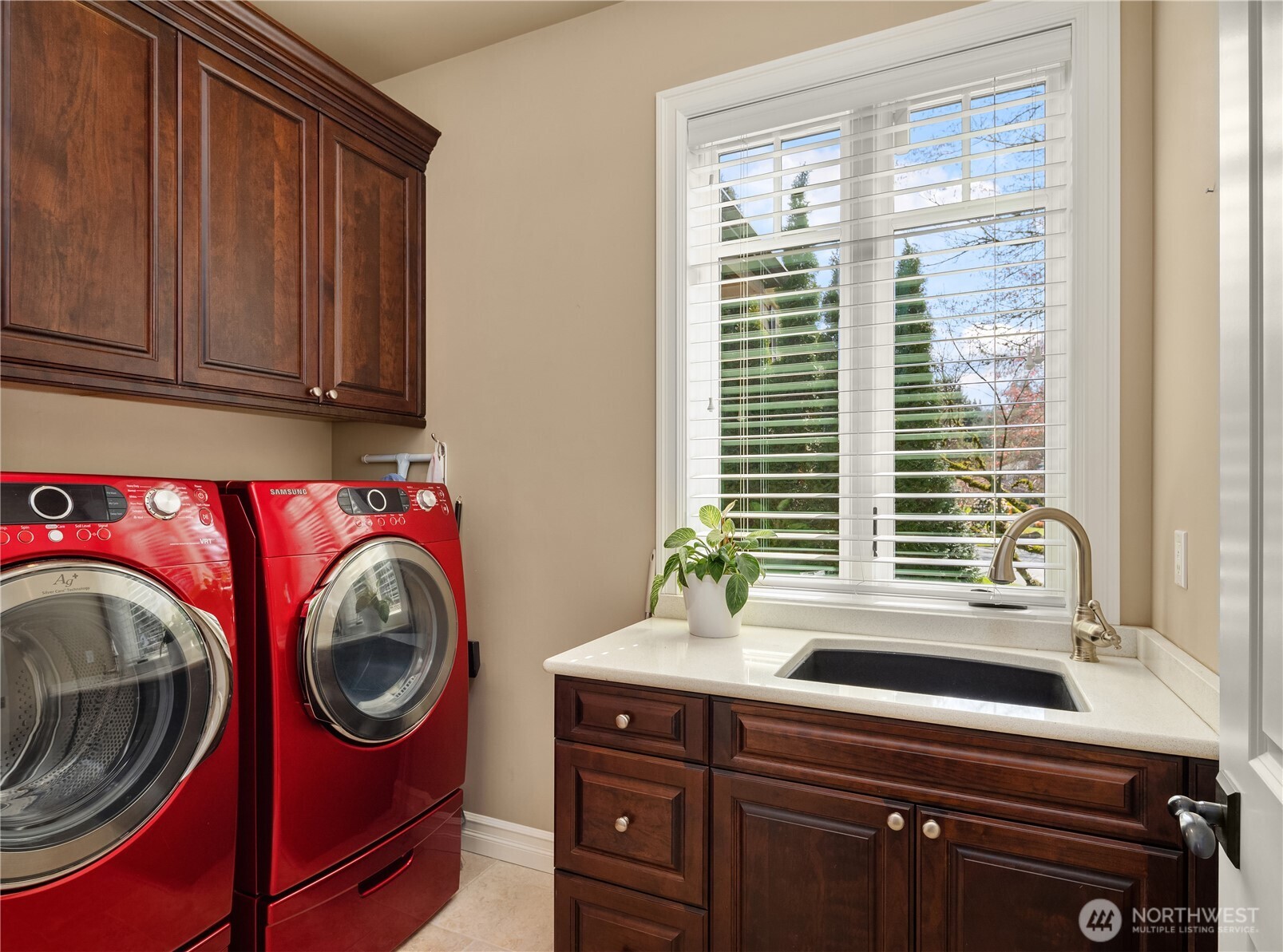 67 Cascade Key Bellevue, WA 98006 - Photo 36 of 39 a bathroom with a sink a mirror and a window