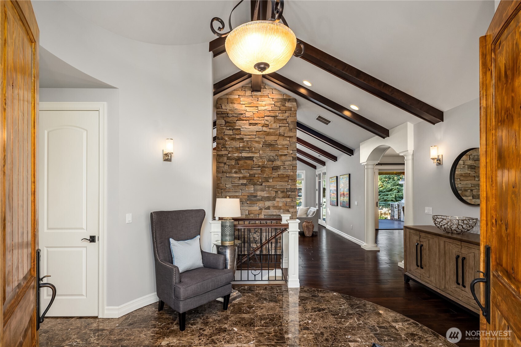 67 Cascade Key Bellevue, WA 98006 - Photo 4 of 39 a living room with furniture and a wooden floor