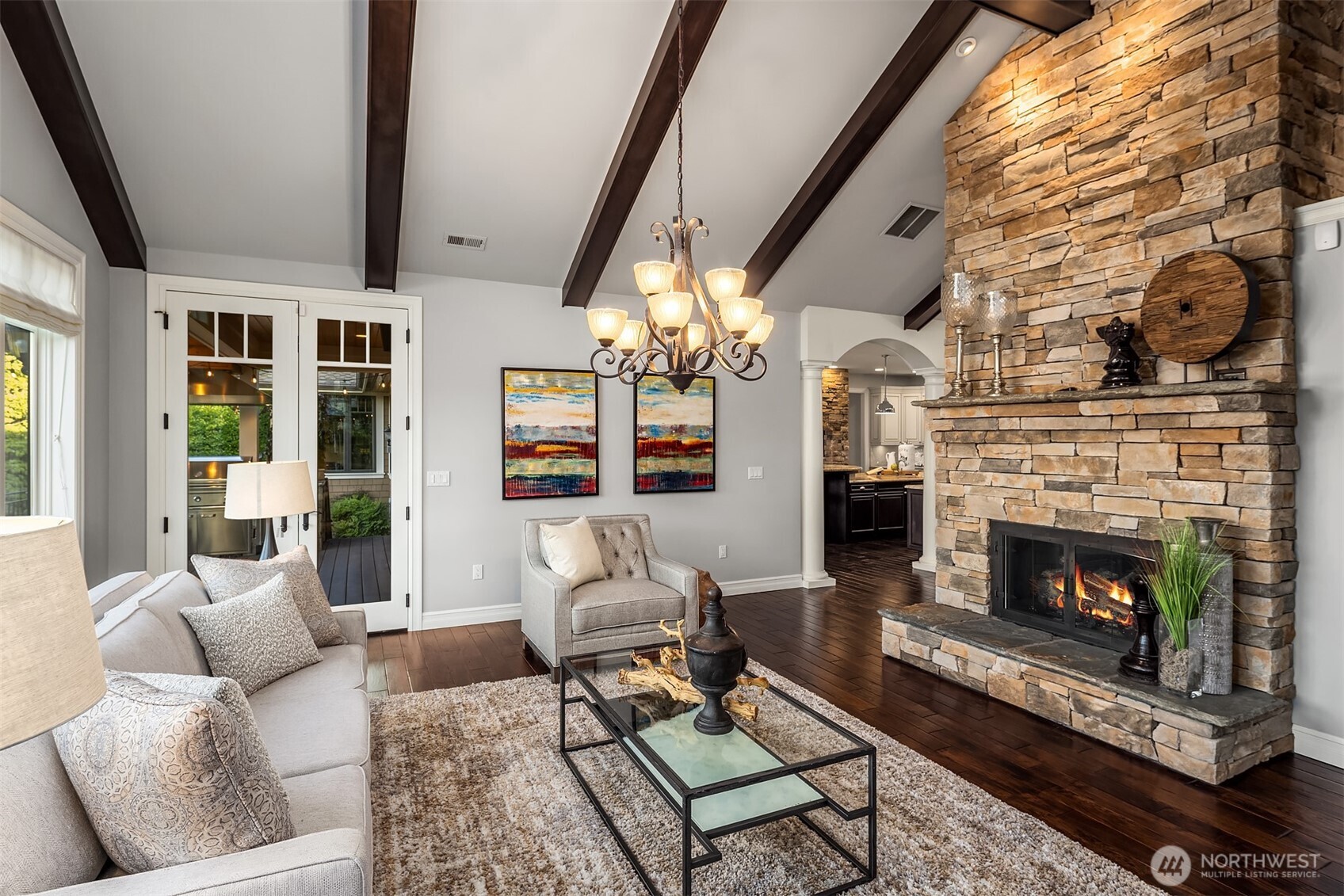 67 Cascade Key Bellevue, WA 98006 - Photo 7 of 39 a living room with furniture a window and a fireplace