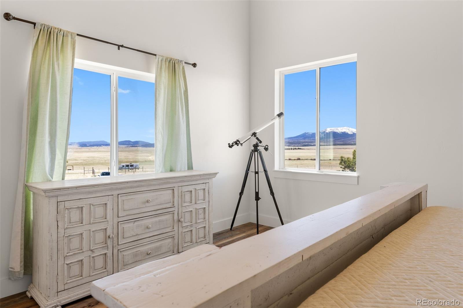 431 Rudisill Street Fairplay, CO 80440 - Photo 21 of 48 a view of house with wooden floor and a window